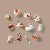 imageLenox 6361265 Snoopy ampamp Friends 11Piece Christmas Tree Ornament Set Display Stand12Piece Ornament Set  12 Days of Christmas Mini Ornaments